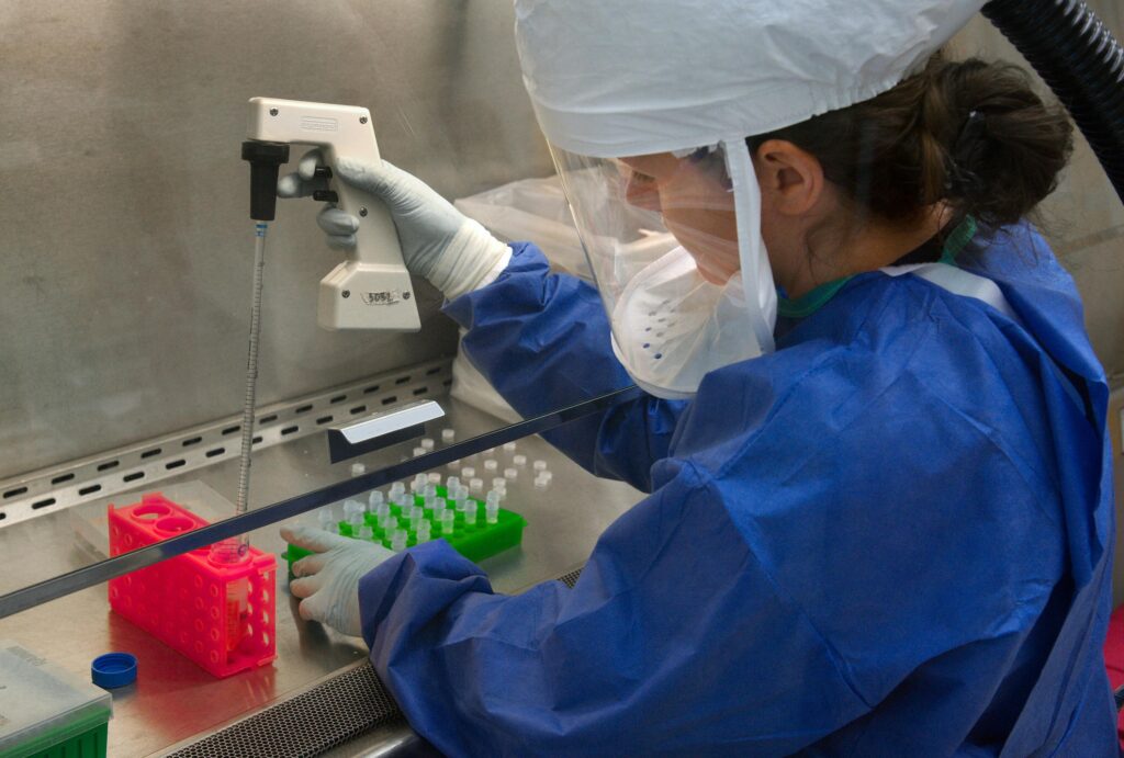 female scientist wearing a safety mask
